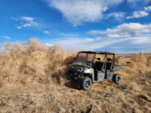 Tumbleweed tower compared to the size of a standard side-by-side. 